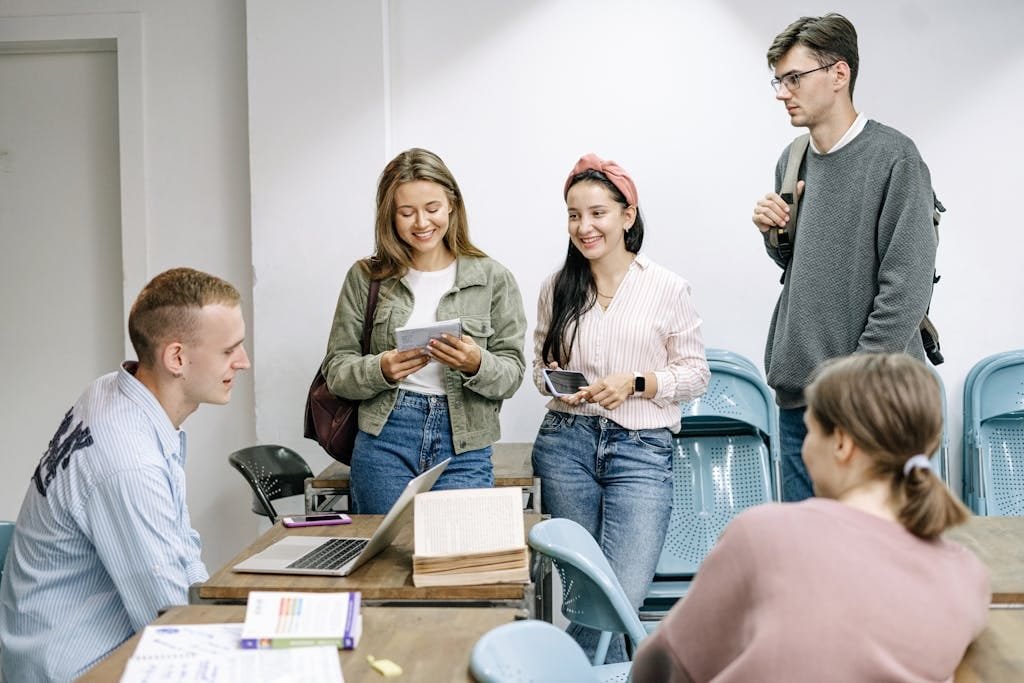 A diverse group of STEM professionals engaged in a discussion at a clinical research workspace